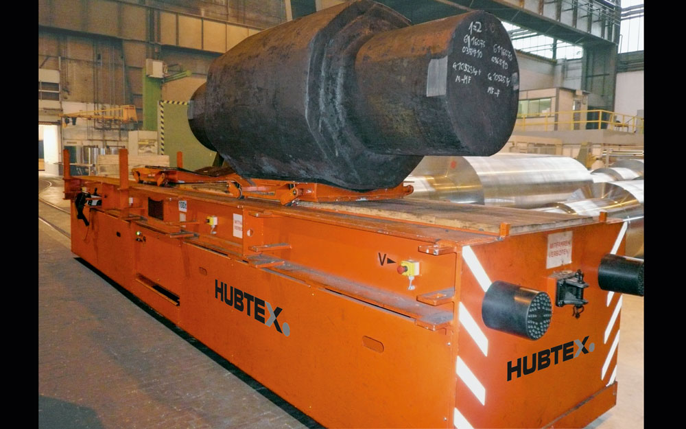 Hubtex Rail mounted truck carrying a heavy load